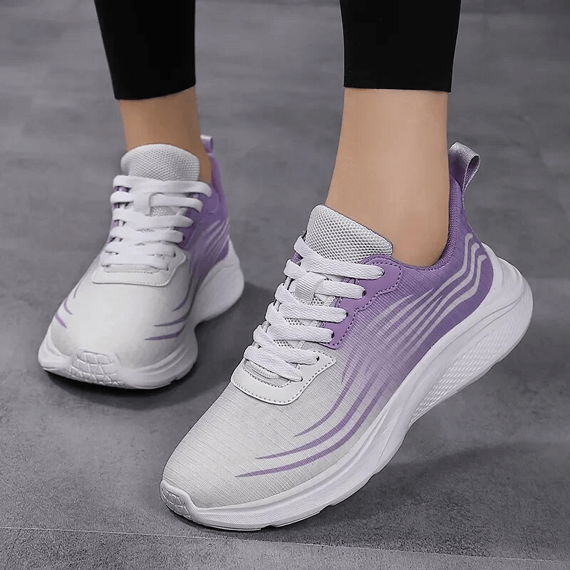 Women's mesh breathable flexible sneakers SF1708 in purple and white, perfect for sports with a comfortable slip-on fit.